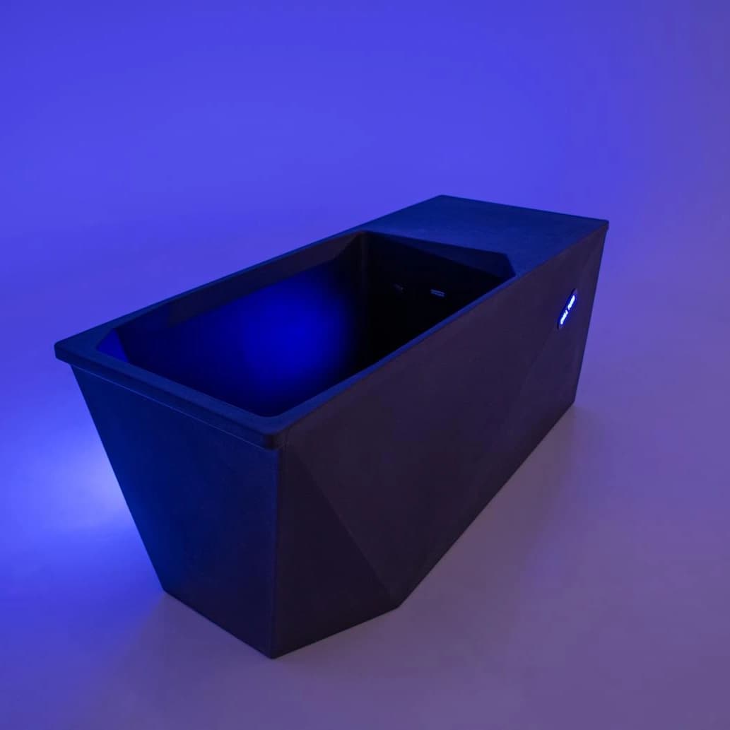 Chill Tubs Lite cold plunge illuminated blue, complete three-quarter studio view