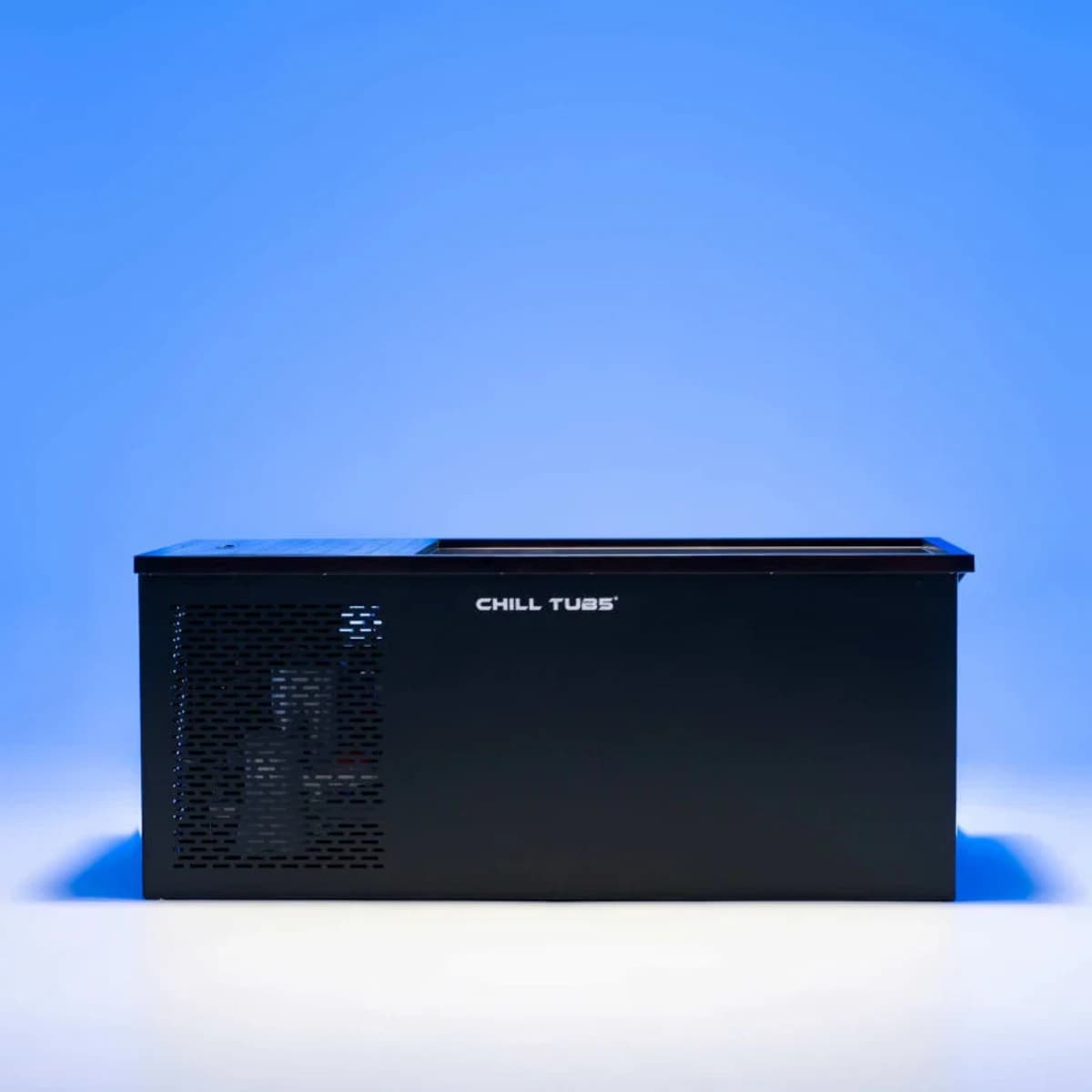 Side view of the Chill Tubs Original cold plunge in a blue-lit studio