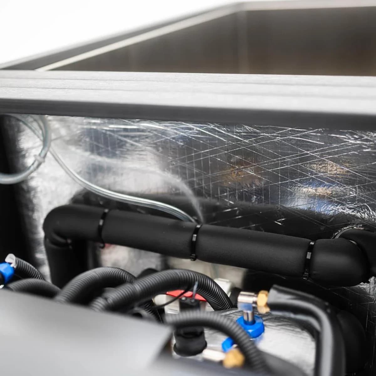Close view of cooling equipment inside the Original cold plunge