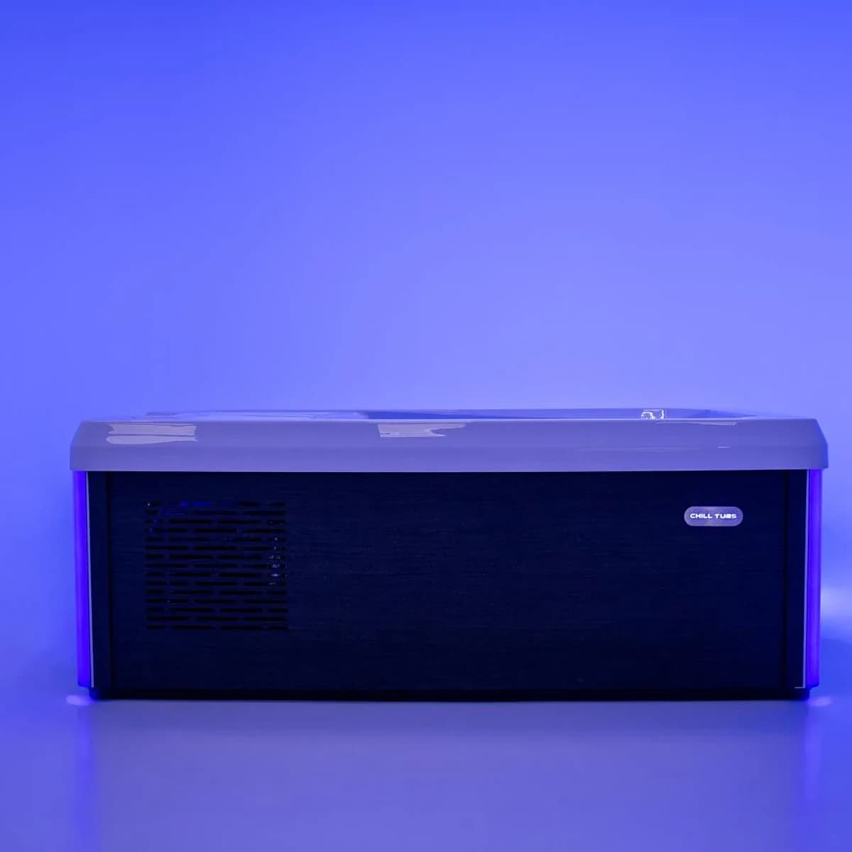 Long side of the Pro cold plunge under blue lighting