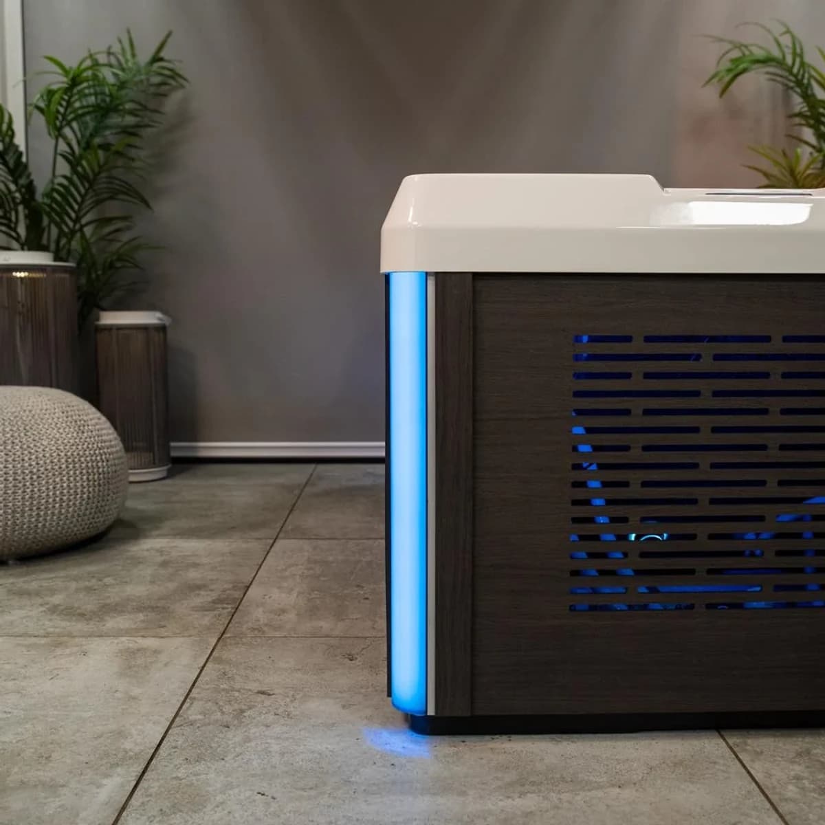Blue-lit corner and vent of the Pro cold plunge cabinet