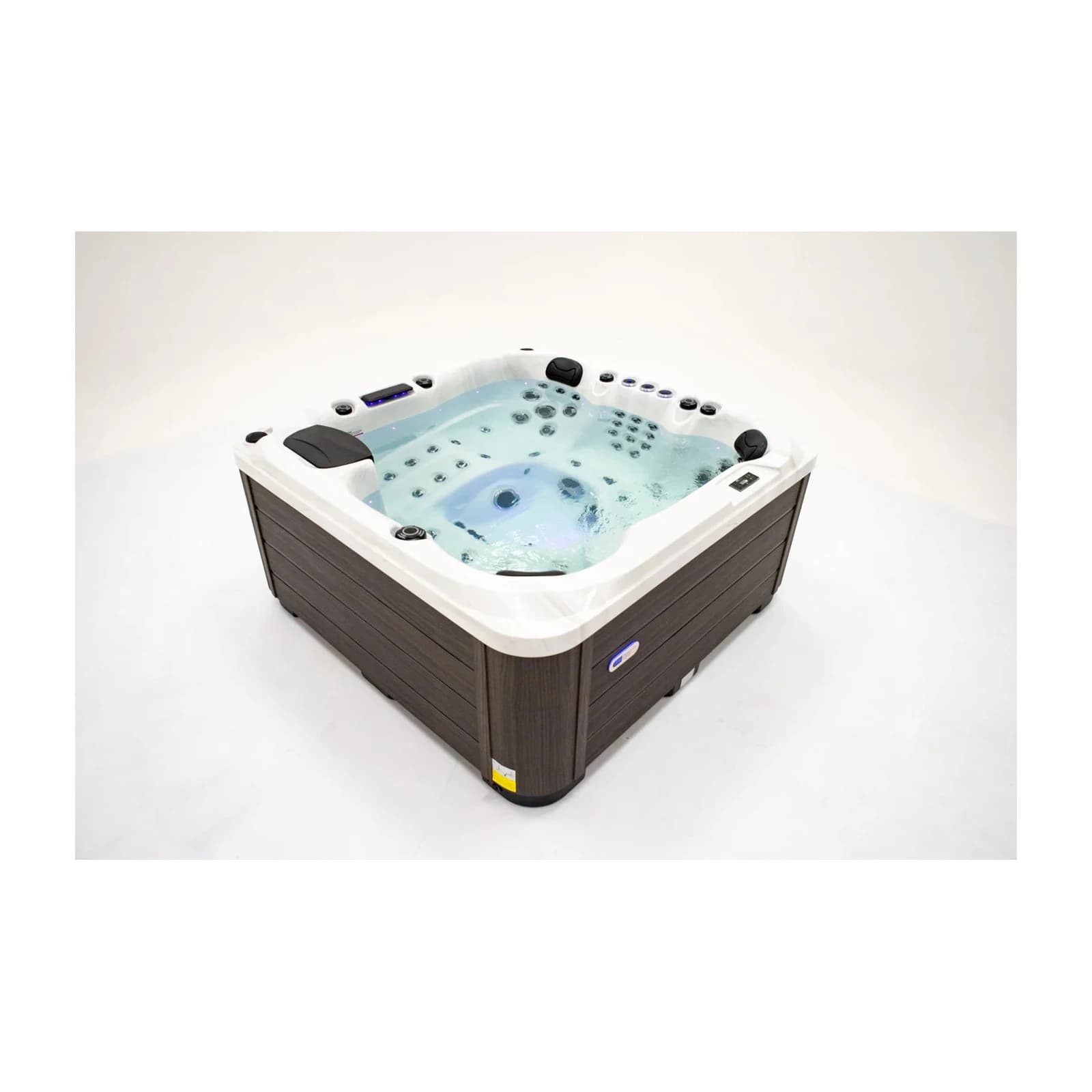 Platinum Spas Palma hot tub filled with water, complete three-quarter product view