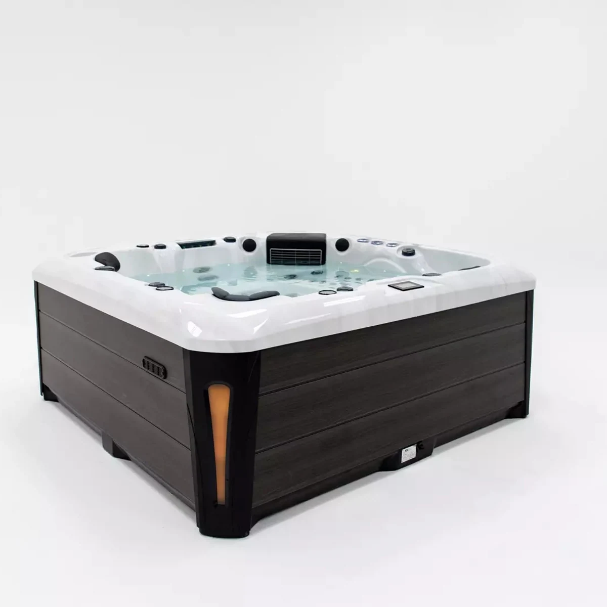 Platinum Spas Tokyo hot tub with water, front studio view