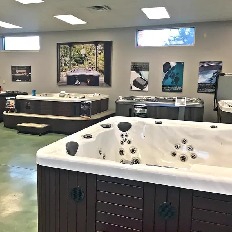 Hot tubs displayed inside the Southern Leisure Arlington showroom