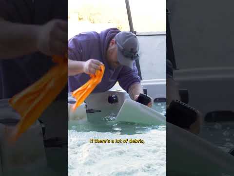 Jared demonstrating Southern Leisure’s Premium Drain & Clean process