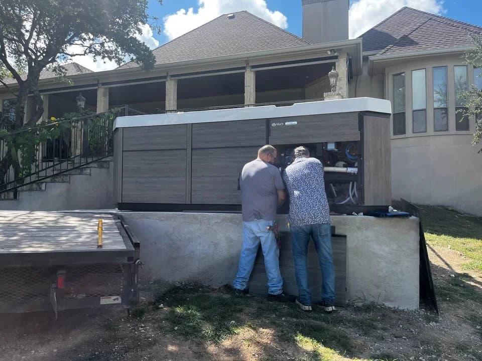 Southern Leisure crew at the equipment side of an installed S150 swim spa
