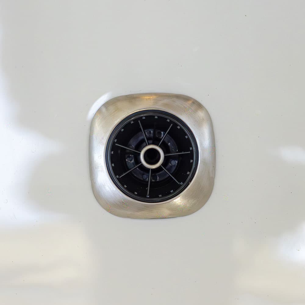 Brushed stainless jet in a white shell