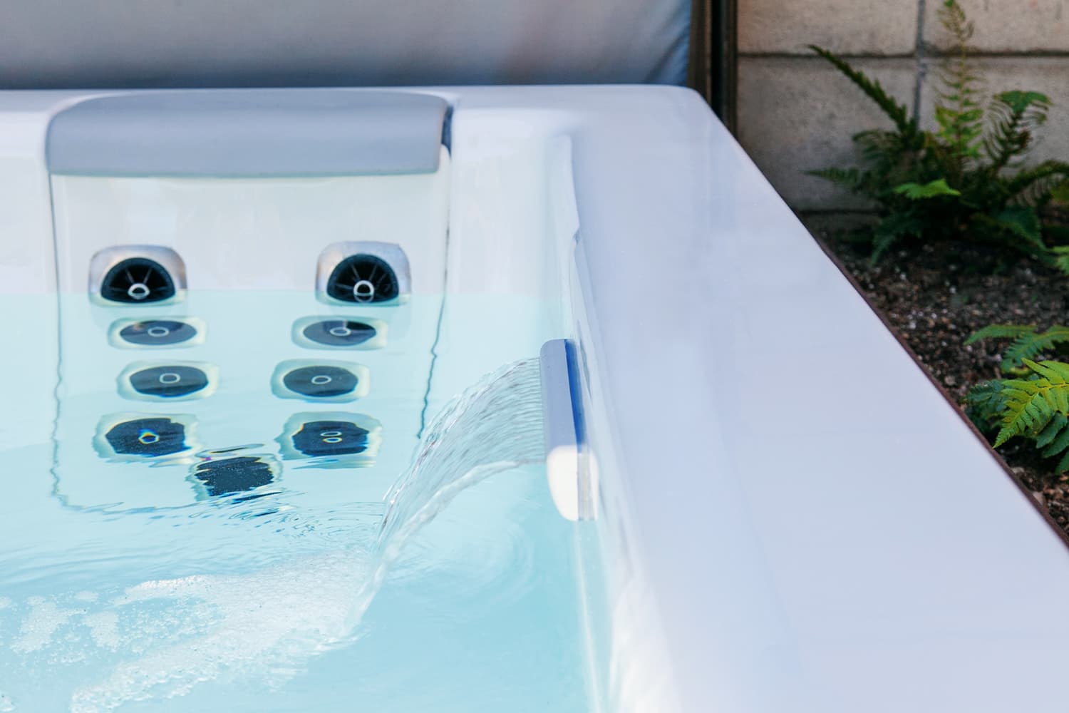 Water feature pouring beside a JetPak seat