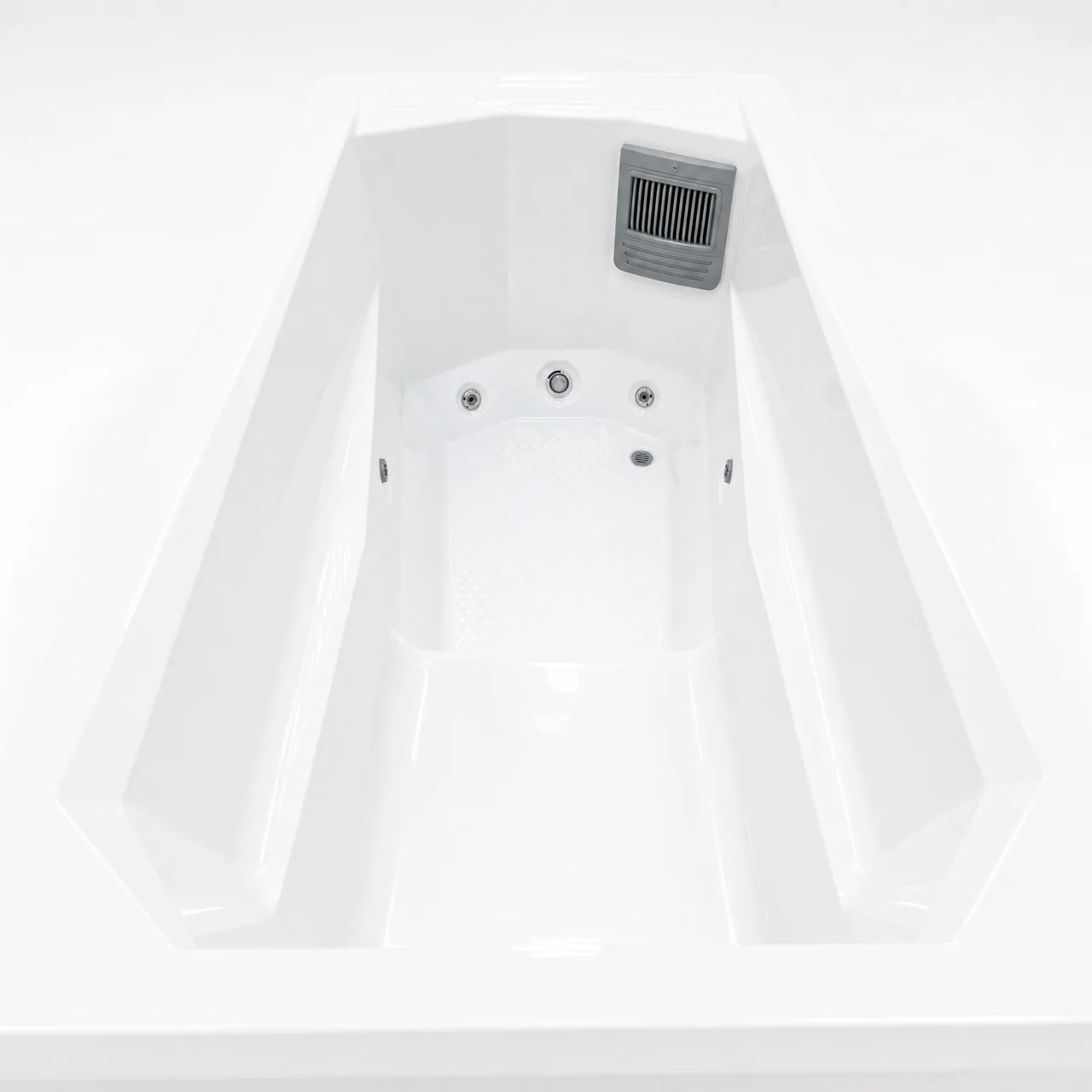 Chill Tubs Pro white acrylic interior showing the skimmer, circulation jets, central light and floor drain.